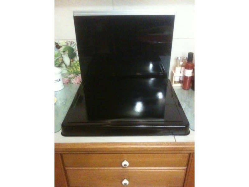 Plaque de protection pour plaque de cuisson